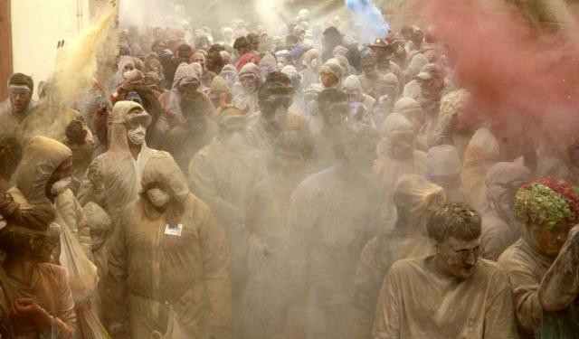Local revellers celebrate "Clean Monday" with a colourful "flour-war", a traditional activity marking the end of the carnival season in the port town of Galaxidi, some 200 km (125 miles) north west from Athens February 19, 2007. Clean Monday sees the climax to carnival season and the start of Lent.  REUTERS/Yannis Behrakis (GREECE)