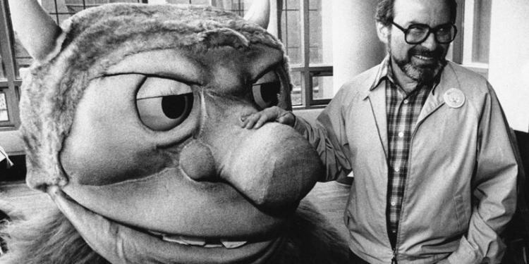 FILE - In this Sept. 25, 1985 file photo, author Maurice Sendak poses with one of the characters from his book "Where the Wild Things Are," designed for the operatic adaptation of his book in St. Paul, Minn. Sendak died, Tuesday, May 8, 2012 at Danbury Hospital in Danbury, Conn. He was 83. (AP Photo, file)