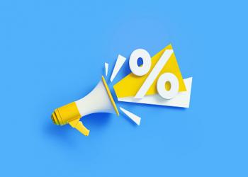 Percentage sign coming out from a yellow megaphone on blue background. Horizontal composition with copy space. Great use for sale and percent concepts.