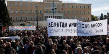 Protesters take part in a demonstration in front of the parliament building, following the collision of two trains, near the city of Larissa, in Athens, Greece, March 5, 2023. The banner reads "It was not a human mistake - Union of Hellenic Train Workers" REUTERS/Alkis Konstantinidis