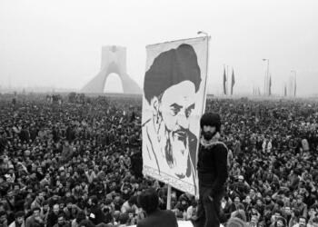 Demonstrators hold up a poster of exiled Shiite Muslim leader Ayatollah Khomeini during an anti-shah demonstration in Tehran, the Iranian capital, on Dec. 10, 1978. The Iranian revolution in 1979 had a powerful effect on the wider Muslim world, particularly among Shiites.