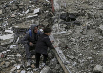 epa11229082 Palestinians search for missing people under the rubble of the destroyed house of the Al Hajj family following an Israeli air strike, in Al Nusairat refugee camp, southern Gaza Strip, 19 March 2024. According to the Palestinian Ministry of Health, more than 10 members of the same family were killed and six remain trapped under the rubble following an overnight Israeli air strike. More than 31,500 Palestinians and over 1,300 Israelis have been killed, according to the Palestinian Health Ministry and the Israel Defense Forces (IDF), since Hamas militants launched an attack against Israel from the Gaza Strip on 07 October 2023, and the Israeli operations in Gaza and the West Bank which followed it.  EPA/MOHAMMED SABER