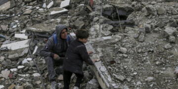 epa11229082 Palestinians search for missing people under the rubble of the destroyed house of the Al Hajj family following an Israeli air strike, in Al Nusairat refugee camp, southern Gaza Strip, 19 March 2024. According to the Palestinian Ministry of Health, more than 10 members of the same family were killed and six remain trapped under the rubble following an overnight Israeli air strike. More than 31,500 Palestinians and over 1,300 Israelis have been killed, according to the Palestinian Health Ministry and the Israel Defense Forces (IDF), since Hamas militants launched an attack against Israel from the Gaza Strip on 07 October 2023, and the Israeli operations in Gaza and the West Bank which followed it.  EPA/MOHAMMED SABER