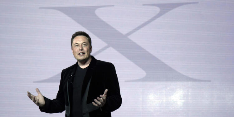 FILE - Elon Musk, CEO of Tesla Motors Inc., introduces the Model X car at the company's headquarters Tuesday, Sept. 29, 2015, in Fremont, Calif. Musk may want to send “tweet” back to the birds, but the ubiquitous term for posting on the site he now calls X is here to stay, at least for now.  For one, the word is still plastered all over the website formerly known as Twitter. Write a post, you still need to press a blue button that says “tweet” to publish it. To repost it, you still tap “retweet.”  (AP Photo/Marcio Jose Sanchez, File)