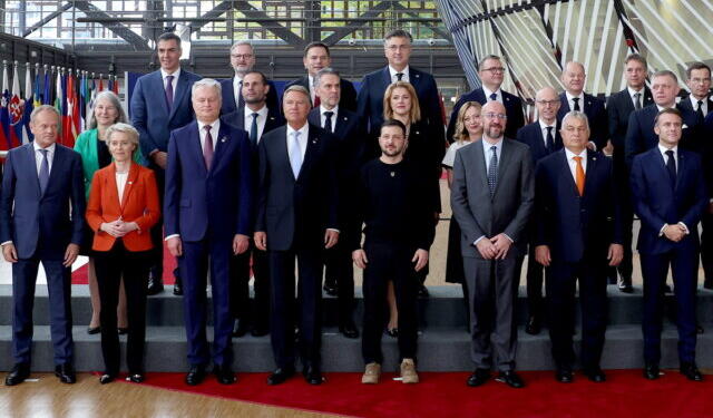 epa11663936 President of Ukraine Volodymyr Zelenskyy (front row C) and European leaders pose for a family photo before the European Council summit in Brussels, Belgium, 17 October 2024. EU leaders are meeting in Brussels to discuss Ukraine, the Middle East, competitiveness, migration and foreign affairs.  EPA/CHRISTOPHER NEUNDORF
