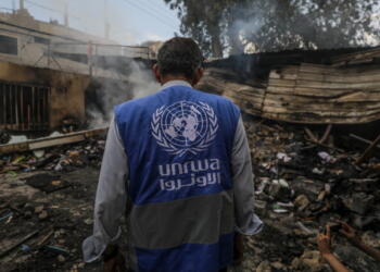 epa11339653 An UNRWA employee inspects a destroyed United Nations school following an air strike in Al Nuseirat refugee camp, central Gaza Strip, 14 May 2024.  At least six people were killed in the strike which hit the UNRWA (United Nationas Relief and Works Agency for Palestinians in the near east) school, according to the Palestinian Civil Defense in Gaza. More than 35,000 Palestinians and over 1,455 Israelis have been killed, according to the Palestinian Health Ministry and the Israel Defense Forces (IDF), since Hamas militants launched an attack against Israel from the Gaza Strip on 07 October 2023, and the Israeli operations in Gaza and the West Bank which followed it.  EPA/MOHAMMED SABER