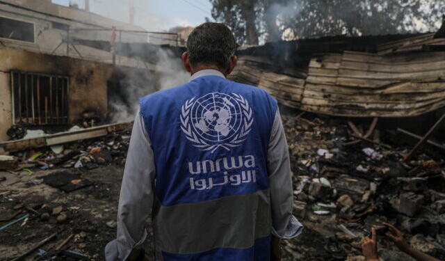epa11339653 An UNRWA employee inspects a destroyed United Nations school following an air strike in Al Nuseirat refugee camp, central Gaza Strip, 14 May 2024.  At least six people were killed in the strike which hit the UNRWA (United Nationas Relief and Works Agency for Palestinians in the near east) school, according to the Palestinian Civil Defense in Gaza. More than 35,000 Palestinians and over 1,455 Israelis have been killed, according to the Palestinian Health Ministry and the Israel Defense Forces (IDF), since Hamas militants launched an attack against Israel from the Gaza Strip on 07 October 2023, and the Israeli operations in Gaza and the West Bank which followed it.  EPA/MOHAMMED SABER